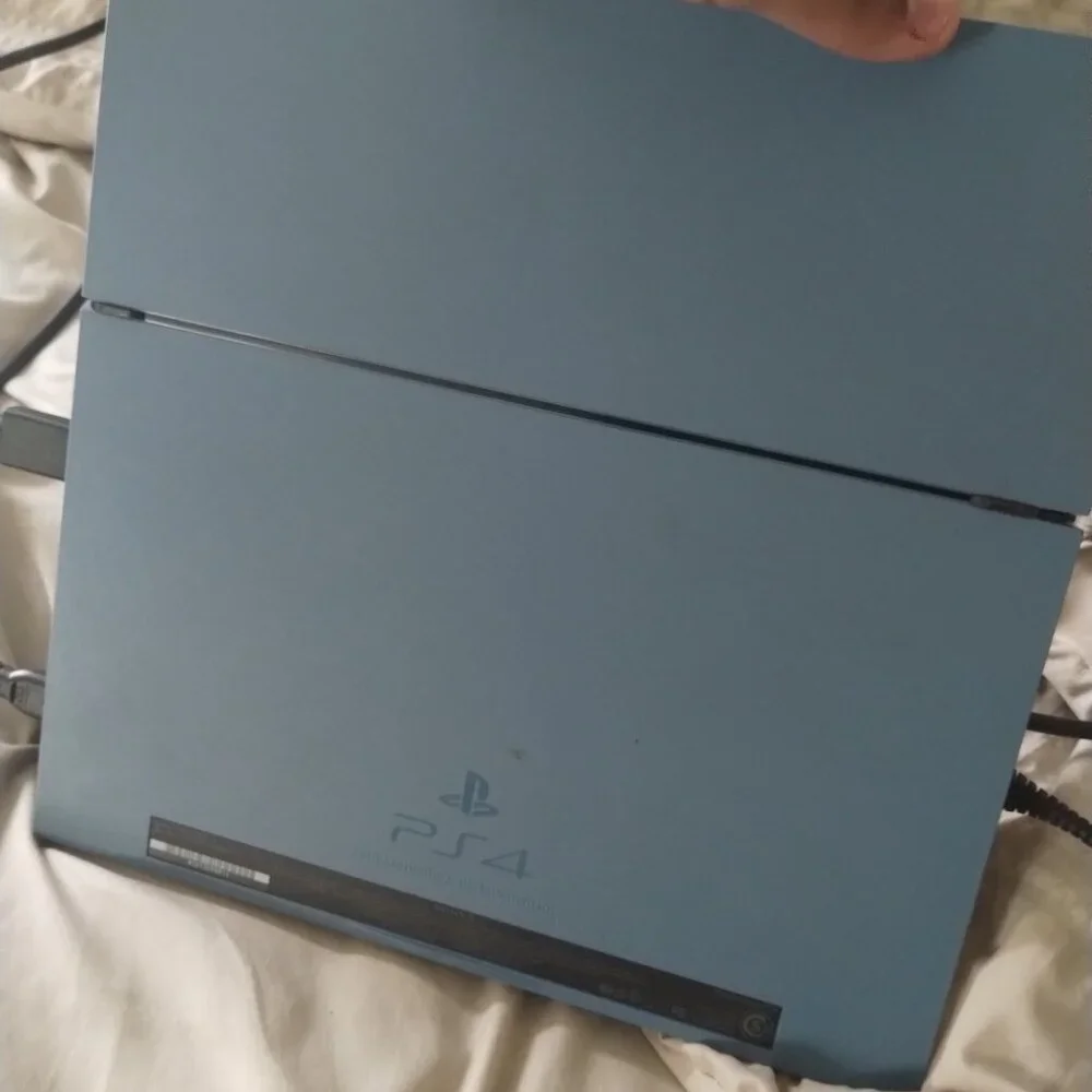 Limited edition PS4 with HDMI power cord and controller